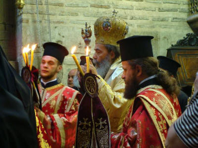 His Beatitude Theophilos III, Patriarch of Jerusalem celebrating Pentecost Sunday at the Church of the Anastasis - or, as it's known in the Latin West, the Church of the Holy Sepulchre in Jerusalem. 
